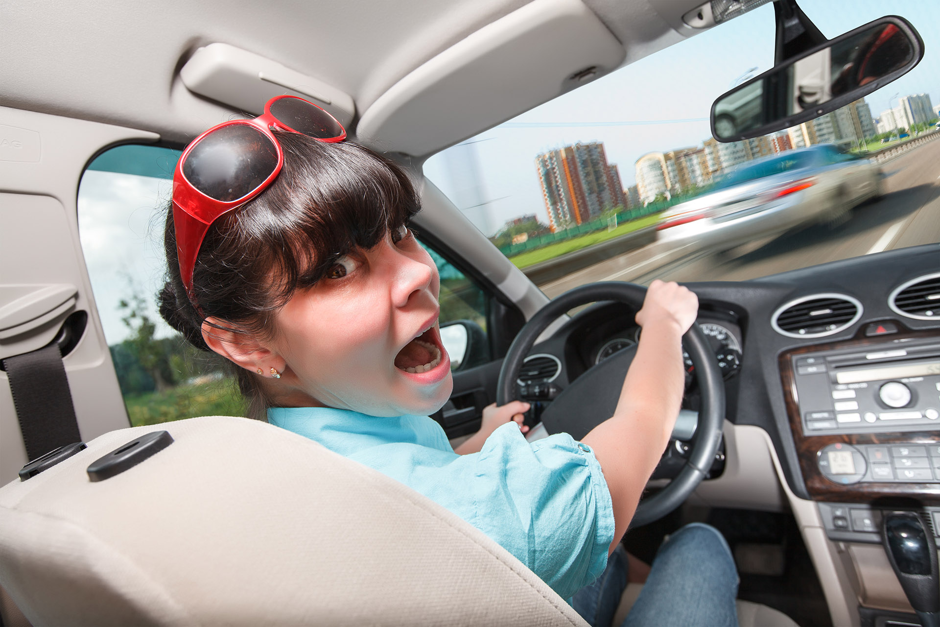 Woman Driving Carelessly